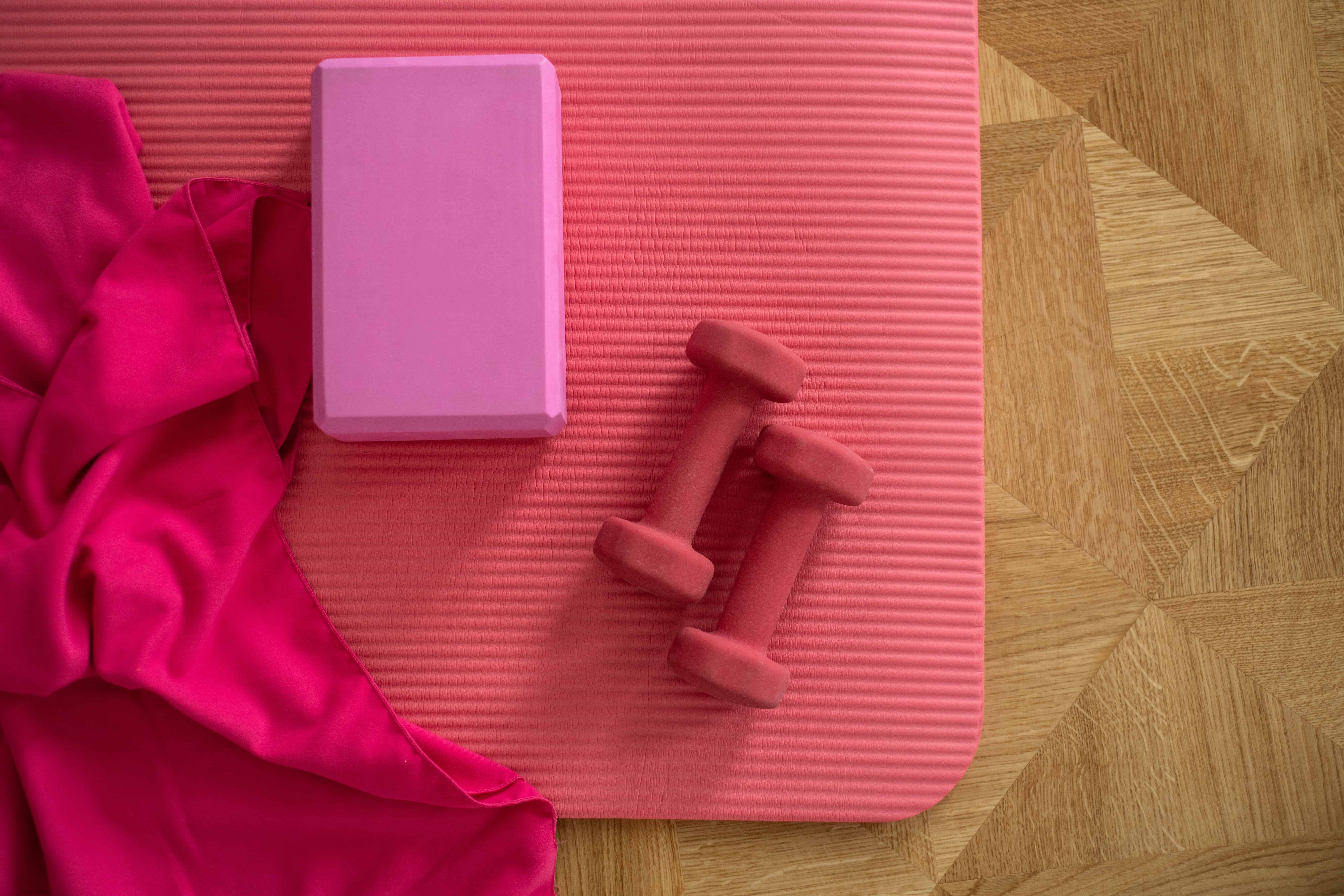 pink exercise mat with weights